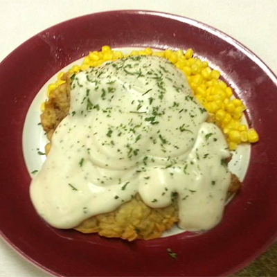 Fairview Farms country fried steak smothered in rich gravy